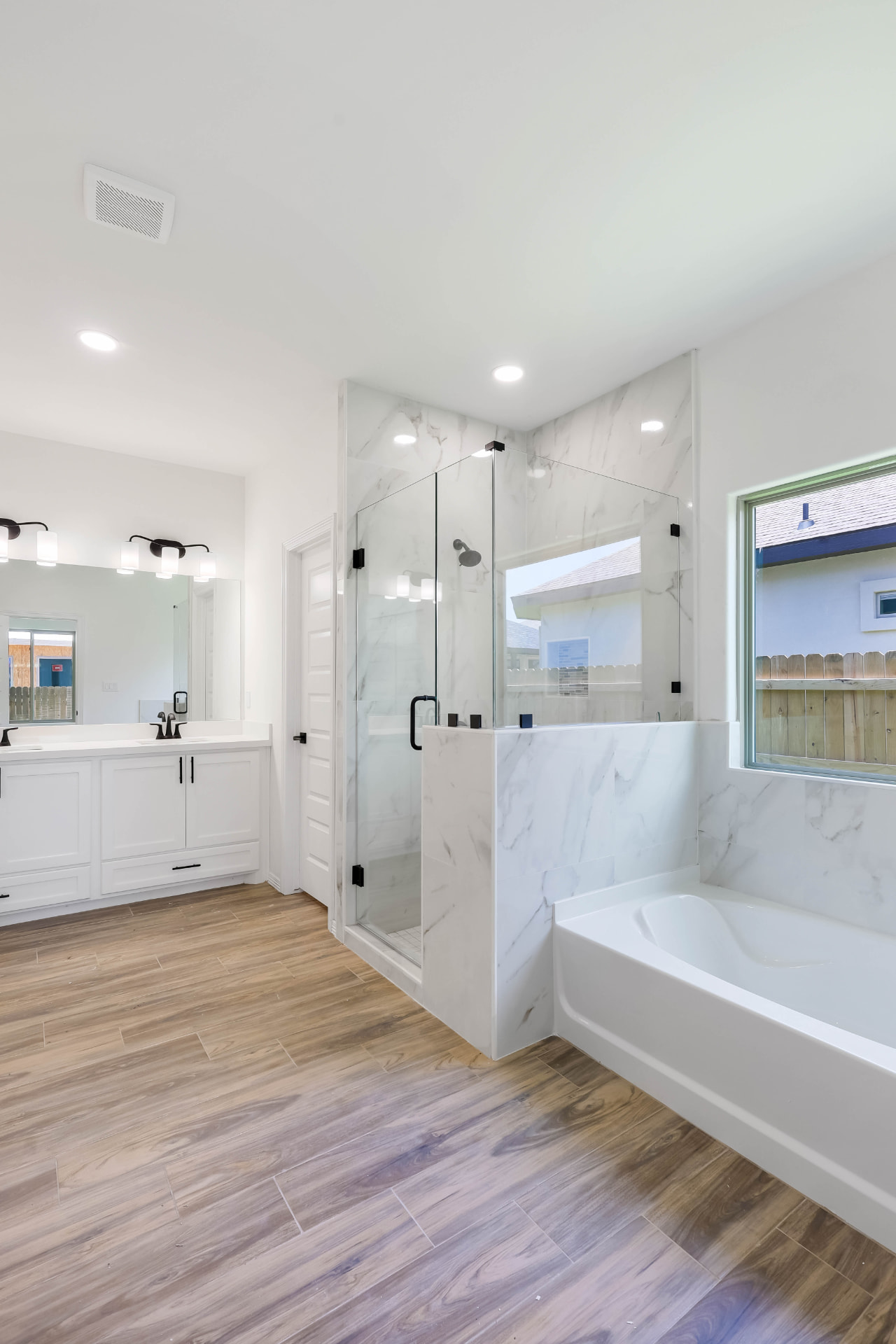Primary bath · marble surround